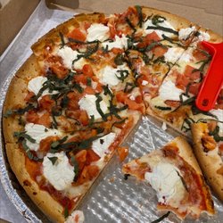 Lenny's Pizza - Gluten free pizza - added on tomato , basil and ricotta