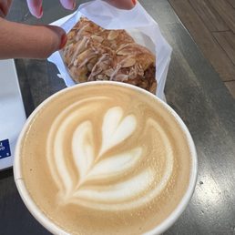 Hot vanilla latte and bear claw pastry