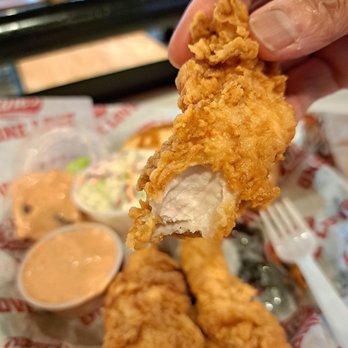 Raising Cane's Chicken Fingers - Inside a chicken finger - Chicken Shop Near Me - Roseville, California Raising Cane's Chicken Fingers - Inside a chicken finger - Chicken Shop Near Me - Roseville, California