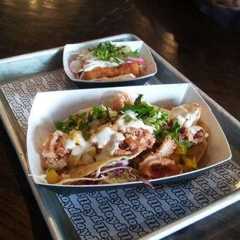 Lloyd Taco Factory - Rock squid tostada(front) and fish taco - Tacos Near Me - Buffalo, New York Lloyd Taco Factory - Rock squid tostada(front) and fish taco - Tacos Near Me - Buffalo, New York
