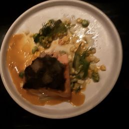 Grilled salmon with greens. Grilled salmon with greens.