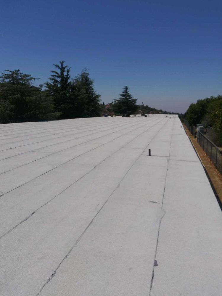 Slide of Torres Roofing