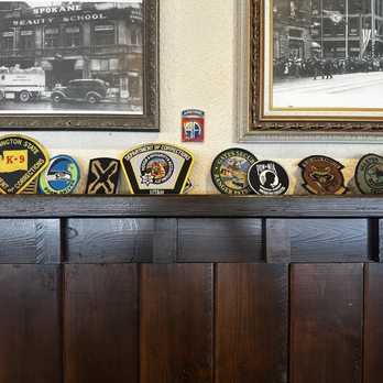 Wolffy's Hamburgers - Nice tribute decor with law enforcement patches. - Breakfast & Brunch Near Me - Airway Heights, Washington Wolffy's Hamburgers - Nice tribute decor with law enforcement patches. - Breakfast & Brunch Near Me - Airway Heights, Washington