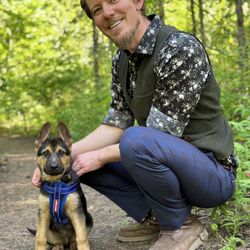 Wild Oak Wellness - Dr. David Campbell and his puppy Enoch taking a hike in Post Falls Community Forest.