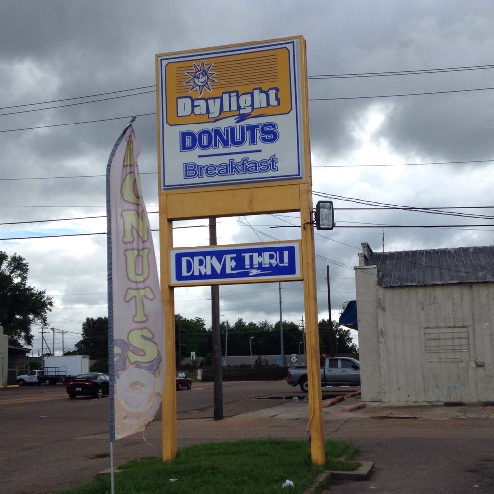Daylight Donuts - a sign for a drive thru - Donuts Near Me - Clarksdale, Mississippi Daylight Donuts - a sign for a drive thru - Donuts Near Me - Clarksdale, Mississippi