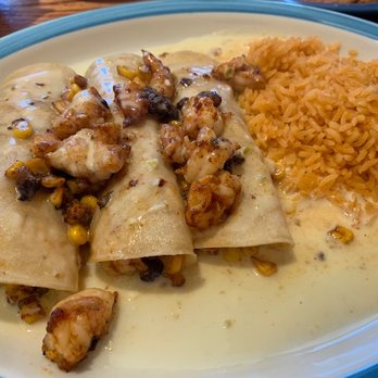 La Charreada Bloomington - Shrimp enchiladas with rice. They are on the menu as "Fiesta de Puebla". - Mexican Near Me - Bloomington, Indiana