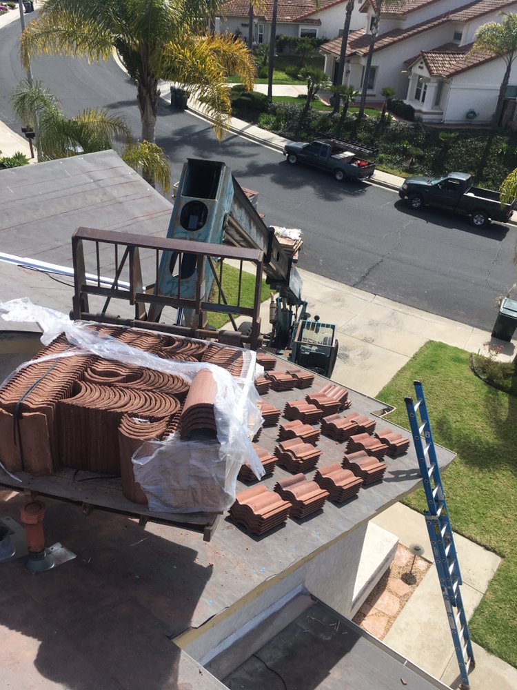 Slide of Vulcan Roofing Co