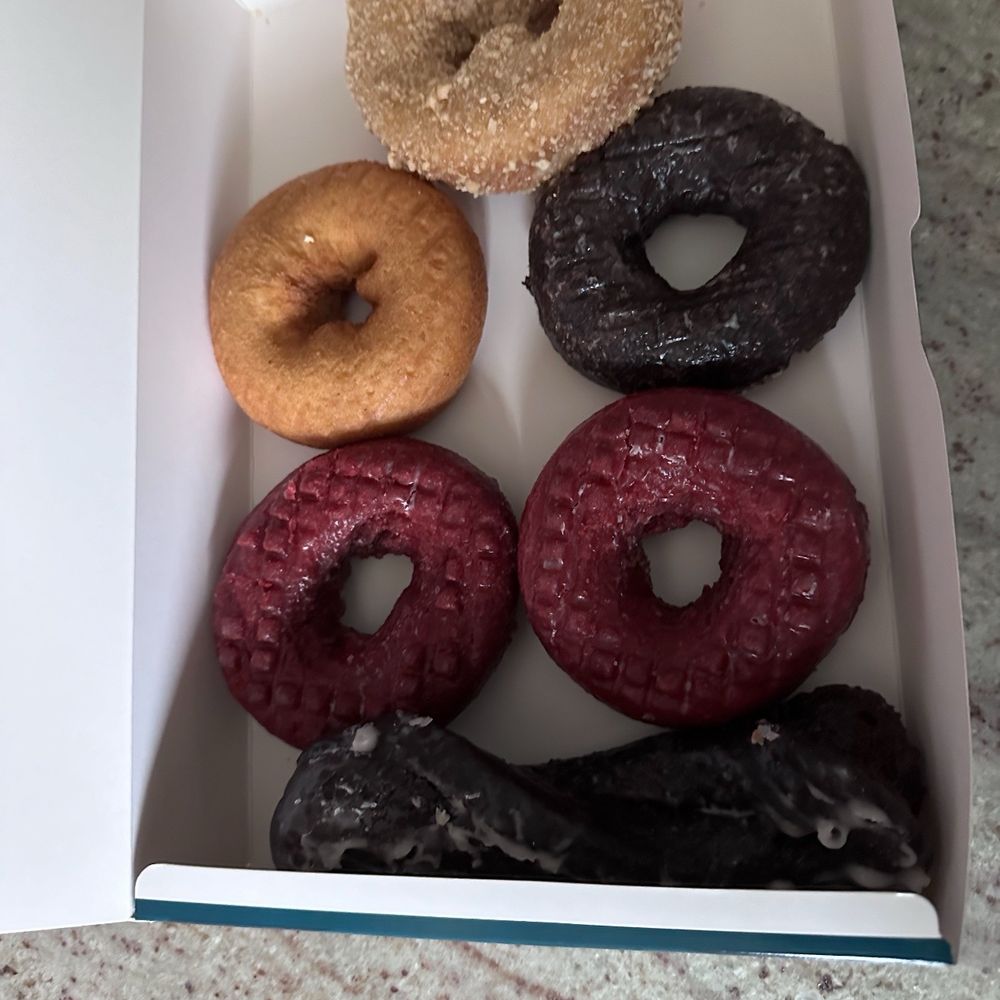Our take home donuts - chocolate glaze stick, chocolate glaze, plain, red velvet and coconut Our take home donuts - chocolate glaze stick, chocolate glaze, plain, red velvet and coconut