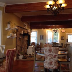 Tea Cup Cafe & Bakery - This is the dining area. Very nice with what looks like a functional wood burning stove.