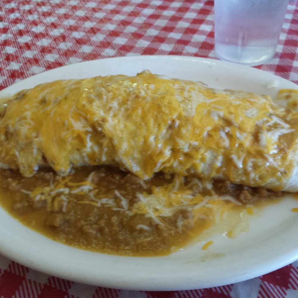 El Corral Cafe - Breakfast burrito. Smothered in green chile. $6.50. - Mexican Near Me - Corona, New Mexico