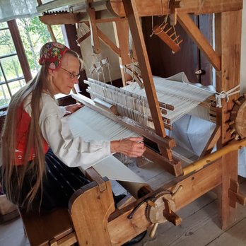 Skansen - An Actress Making Cloth (Pretty Cool) - Botanical Gardens Near Me - Stockholm, Alberta