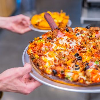 Coconut Kenny's Pizza - Anacortes - Red Sauce, Pepperoni, Ham, Italian & Portuguese Sausage, Bacon, Red Onions, Mushrooms, Tomatoes, Green Onions & Black Olives. - Pizza Near Me - Anacortes, Washington Coconut Kenny's Pizza - Anacortes - Red Sauce, Pepperoni, Ham, Italian & Portuguese Sausage, Bacon, Red Onions, Mushrooms, Tomatoes, Green Onions & Black Olives. - Pizza Near Me - Anacortes, Washington