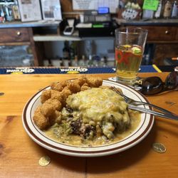 The Sportsman Bar & Grill - Smothered double green chile burger and tots-excellent