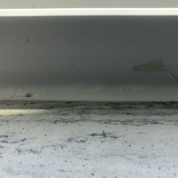Lifetime Home Remodeling - They put caulking over the tape and then tried to rip the tape off. You can also see all the flaws in the caulking. - General Contractors Near Me - Denver, Colorado Lifetime Home Remodeling - They put caulking over the tape and then tried to rip the tape off. You can also see all the flaws in the caulking. - General Contractors Near Me - Denver, Colorado