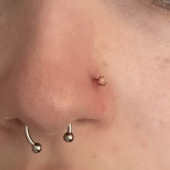 Modern Mods - Arrowhead  - infected nostril piercing - Piercing Near Me - Glendale, Arizona