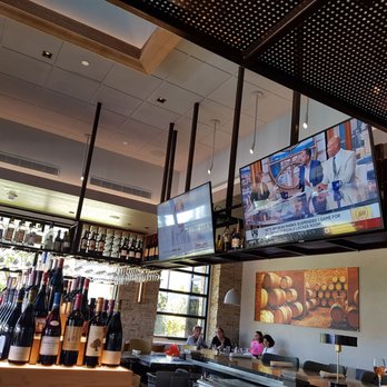 Seasons 52 - The bar has 4 TVs - New American Near Me - Sunrise, Florida Seasons 52 - The bar has 4 TVs - New American Near Me - Sunrise, Florida