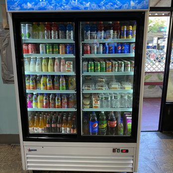 Gran Villa Restaurant - a refrigerated beverage display - Salvadoran Near Me - Brooklyn, New York