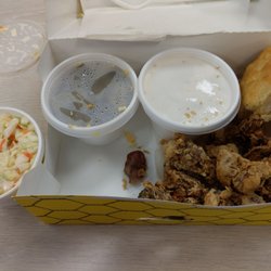 Combo pack of chicken gizzards and livers, coleslaw, green beans, biscuit, and gravy.
