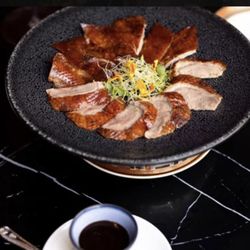 LiLi - The duck is a favorite and the highlight but don't forget about the dim sum