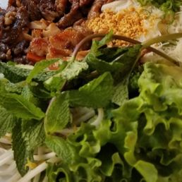 Fresh noodle roll platter. They provide your rice paper wraps that you soak in water to soften and fill with whatever you like shown.