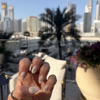 Alpha Nails - My beautiful starfish nails! Trying to show the glitz in the sunshine - Nail Salons Near Me - Huntington Beach, California