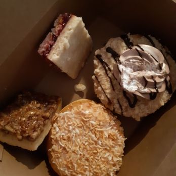The Rolling Pin - Raspberry/coconut square, bourbon/pecan square, lemon curd/coconut doughnut, "chef's special" doughnut. - Bakeries Near Me - Toronto, Ontario The Rolling Pin - Raspberry/coconut square, bourbon/pecan square, lemon curd/coconut doughnut, "chef's special" doughnut. - Bakeries Near Me - Toronto, Ontario