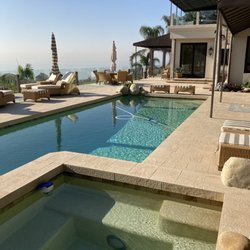 Artistic Landscape - From refinishing your pooldeck to complete pool and spa construction, we can do it all!