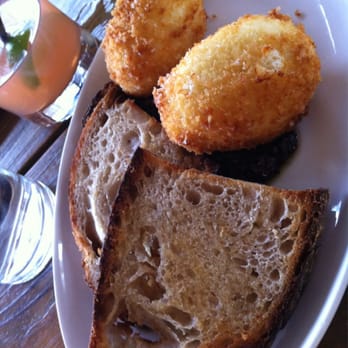 Salty Sow - Goat cheese fritters - American Near Me - Austin, Texas Salty Sow - Goat cheese fritters - American Near Me - Austin, Texas