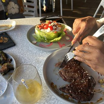 Castaway Burbank - DRY AGED ANGUS RIBEYE 18oz   SMOKED TOMATO SALAD - Bars Near Me - Burbank, California