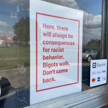 Dante's Woodfire - a sign in the window of a restaurant - Food Trucks Near Me Dante's Woodfire - a sign in the window of a restaurant - Food Trucks Near Me