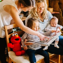 Maternity Maven - A vibrant and healthy postpartum mama with her babes.