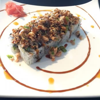 Chopstick - Dynamite roll; salmon mixed with veggies on top with a California roll at the bottom. Topped with eel sauce and spicy mayo. - Japanese Near Me - Killeen, Texas Chopstick - Dynamite roll; salmon mixed with veggies on top with a California roll at the bottom. Topped with eel sauce and spicy mayo. - Japanese Near Me - Killeen, Texas