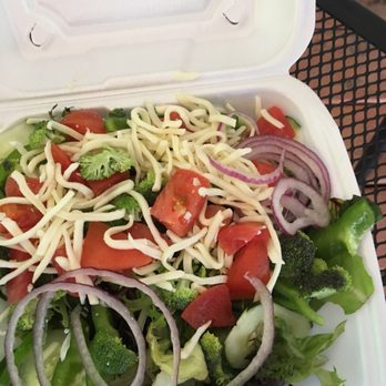 Round The Corner Carry Out - a salad in a styrofoam container - Pizza Near Me - Tarentum, Pennsylvania Round The Corner Carry Out - a salad in a styrofoam container - Pizza Near Me - Tarentum, Pennsylvania