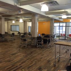 Syracuse CoWorks - More open seating and a view of the conference room