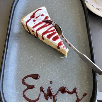 Doc's Seafood & Steaks - Key Lime pie with Raspberry sauce - Seafood Near Me - Corpus Christi, Texas Doc's Seafood & Steaks - Key Lime pie with Raspberry sauce - Seafood Near Me - Corpus Christi, Texas