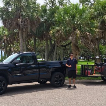 Slice of Lawn - a man standing next to a black truck - Lawn Services Near Me - Safety Harbor, Florida Slice of Lawn - a man standing next to a black truck - Lawn Services Near Me - Safety Harbor, Florida