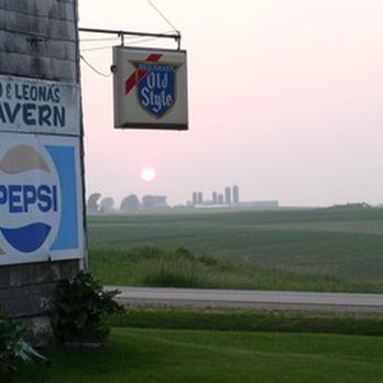 Leo & Leona's - the sun setting over a farm - Bars Near Me - Bangor, Wisconsin Leo & Leona's - the sun setting over a farm - Bars Near Me - Bangor, Wisconsin