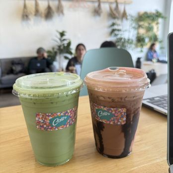 Contra Coffee & Tea - that's my jam (vanilla matcha latte) and lovers and friends (coffee oolong milk tea with chocolate drizzle + strawberry foam) - Coffee & Tea Near Me - Orange, California Contra Coffee & Tea - that's my jam (vanilla matcha latte) and lovers and friends (coffee oolong milk tea with chocolate drizzle + strawberry foam) - Coffee & Tea Near Me - Orange, California