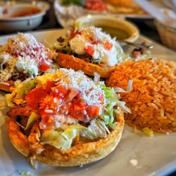 Frida's Cantina & Grill - Sopes with Mexican rice. You can get different proteins. I got chicken, Beef and chorizo. Excellent!