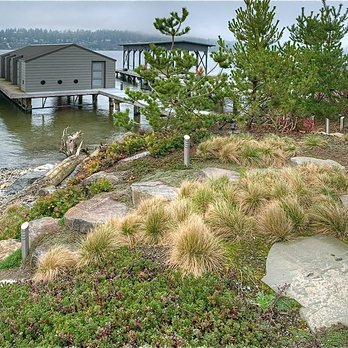 Karlstrom Associates Inc - Transformation of a staid, beach-hugging Kirkland guesthouse into a sleek dwelling - complete with a new stretch of shoreline. - General Contractors Near Me - Seattle, Washington