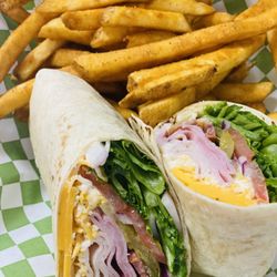 The Twisted Pickle - Our Club Wrap with a side of fries.