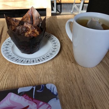 Iconoclast Coffee Roasters - Green tea and an orange sesame muffin - Coffee Roasteries Near Me - Edmonton, Alberta Iconoclast Coffee Roasters - Green tea and an orange sesame muffin - Coffee Roasteries Near Me - Edmonton, Alberta