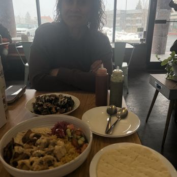 Nosh - Chicken, rice, hummus, picketed cabbage, home made hot sauces, pita bread, Brussels sprouts better than what we usually buy at Sundance - Mediterranean Near Me - Park City, Utah