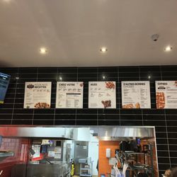 Pizza Hut - Pizza Hut menu on wall