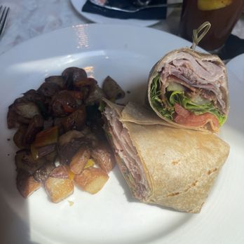 Undercurrent Restaurant - Club Wrap with potatoes - French Near Me - Greensboro, North Carolina Undercurrent Restaurant - Club Wrap with potatoes - French Near Me - Greensboro, North Carolina