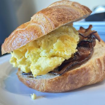 Just Love Coffee Cafe - Breakfast Sandwich on Croissant with Bacon - Coffee & Tea Near Me - Hendersonville, Tennessee Just Love Coffee Cafe - Breakfast Sandwich on Croissant with Bacon - Coffee & Tea Near Me - Hendersonville, Tennessee
