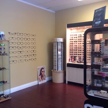 EyeQ Optical - Glasses even on the wall, this place has it all! - Optometrists Near Me - Cooper City, Florida
