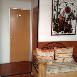 Hostal Menavi - Entrada a unos cuartos