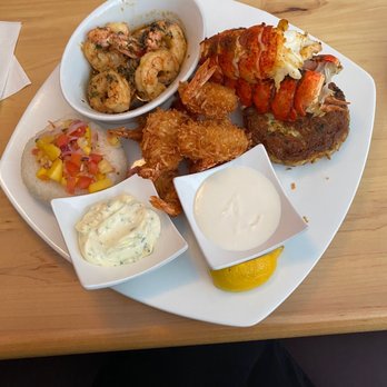 Chop Block Grill - Shrimp scampi, coconut shrimp, crab cake, and lobster. - Steakhouses Near Me - Brooksville, Florida Chop Block Grill - Shrimp scampi, coconut shrimp, crab cake, and lobster. - Steakhouses Near Me - Brooksville, Florida