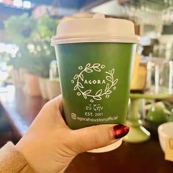 Agora - Vanilla latte with oat milk to go. Cute cups. - Coffee & Tea Near Me - Houston, Texas